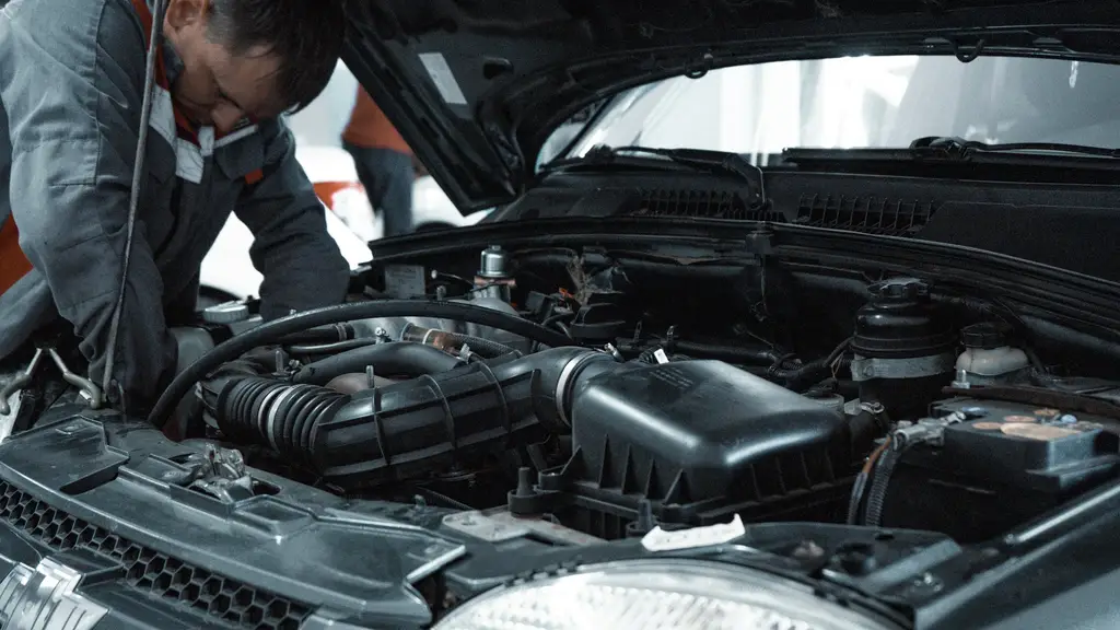 Mechanic inspecting a car engine during a service at Billingshurst MOT & Service Centre